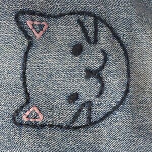 Jeans with Cat Face knees